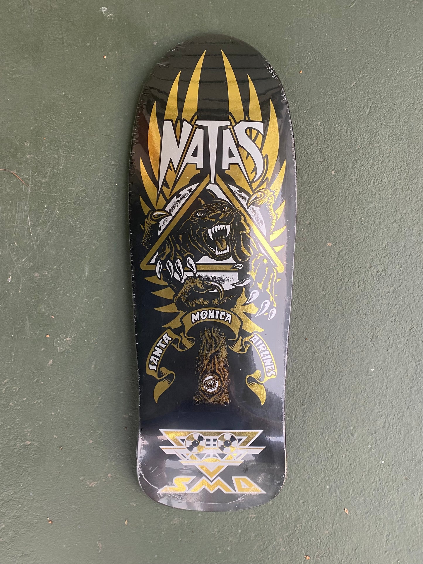 SMA Natas blind bag reissue skateboard deck by Santa Cruz with gold foil panther 3 graphics 10.538in X 30.14in